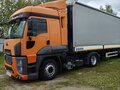 2013 Ford Cargo, оранжевый, 8600000 рублей - вид 2