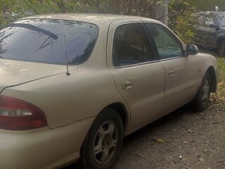 1998 Kia Clarus II, бежевый, 58000 рублей, вид 1