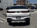 2021 BMW X6 40i III (G06), белый, 7500000 рублей - вид 3