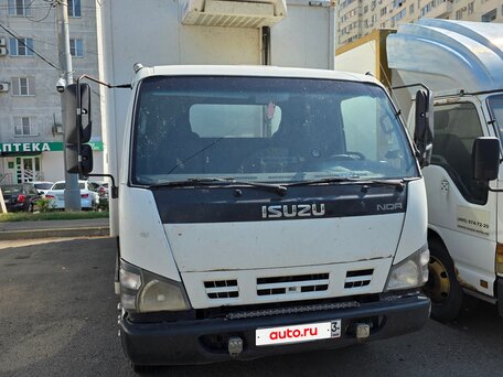 2009 Isuzu Elf (N-series), белый, 1340000 рублей, вид 1