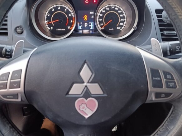 2012 Mitsubishi Lancer X Рестайлинг, пурпурный, 1200000 рублей - вид 7