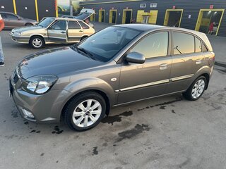2010 Kia Rio II Рестайлинг, серебристый, 545000 рублей, вид 1