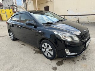 2012 Kia Rio III, чёрный, 606000 рублей, вид 5