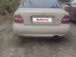 1998 Kia Clarus II, бежевый, 58000 рублей, вид 2