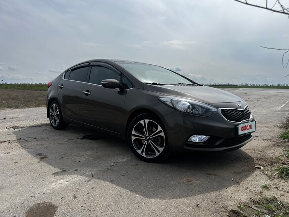 2016 Kia Cerato III Рестайлинг (Classic), коричневый, 1450000 рублей - вид 4