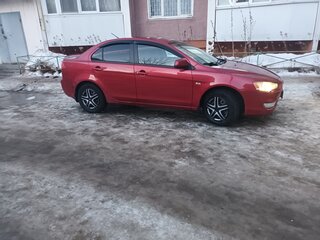 2008 Mitsubishi Lancer X, красный, 615000 рублей, вид 4