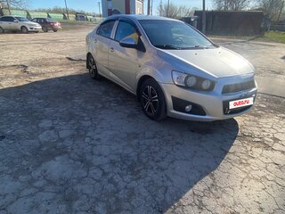 2012 Chevrolet Aveo II, серебристый, 410000 рублей, вид 1