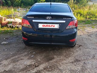 2012 Hyundai Solaris I, чёрный, 380000 рублей, вид 3