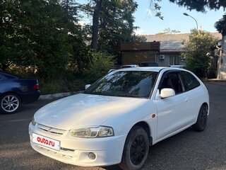 1999 Mitsubishi Mirage V, белый, 193000 рублей, вид 1