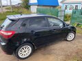 2012 Kia Rio 4-speed III, чёрный, 380000 рублей - вид 1