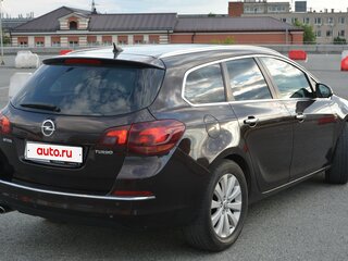 2013 Opel Astra J Рестайлинг, коричневый, 700000 рублей, вид 4