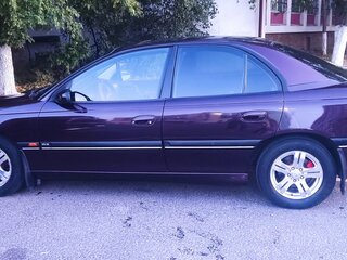 1995 Opel Omega B, пурпурный, 420000 рублей, вид 3