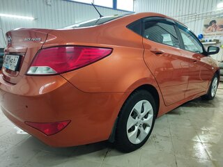 2015 Hyundai Solaris I Рестайлинг, оранжевый, 785000 рублей, вид 5