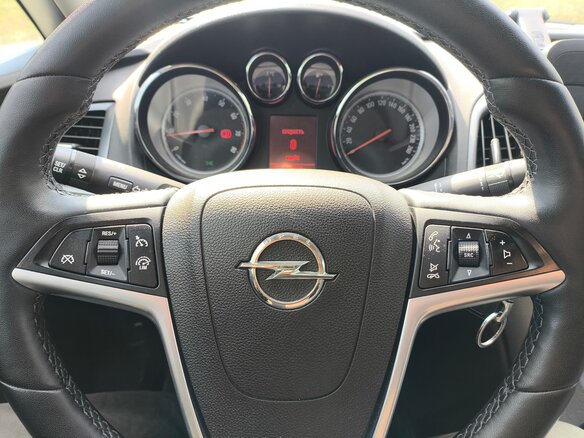 2014 Opel Astra J Рестайлинг, коричневый, 750000 рублей - вид 10
