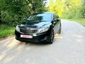 2012 Kia Rio III, чёрный - вид 3