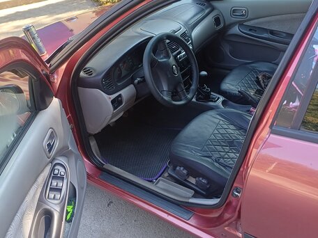 2000 Nissan Almera II (N16), пурпурный, вид 5
