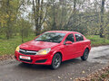 2007 Opel Astra H Рестайлинг, красный - вид 1
