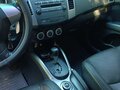2008 Mitsubishi Outlander II, серый, 950000 рублей - вид 4