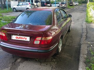 2002 Nissan Almera II (N16) Рестайлинг, красный, 220000 рублей, вид 3