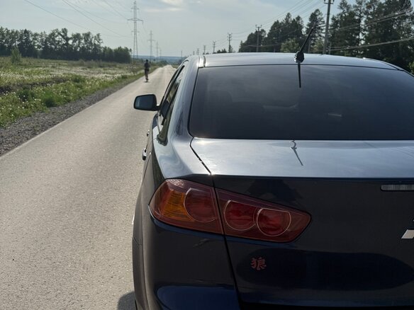 2007 Mitsubishi Lancer X, синий - вид 8