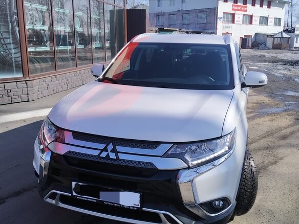 2019 Mitsubishi Outlander III Рестайлинг 3, белый - вид 2