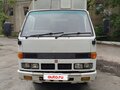 1988 Isuzu Elf (N-series), белый, 450000 рублей