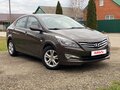 2014 Hyundai Solaris I Рестайлинг, коричневый, 1150000 рублей - вид 2