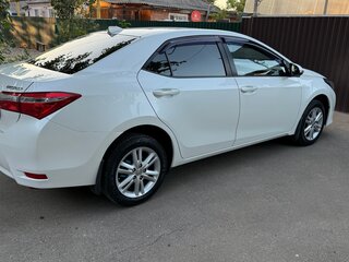 2014 Toyota Corolla XI (E160, E170, E180), белый, 1290000 рублей, вид 4