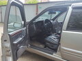 1997 Jeep Grand Cherokee I (ZJ) Рестайлинг, серебристый - вид 7