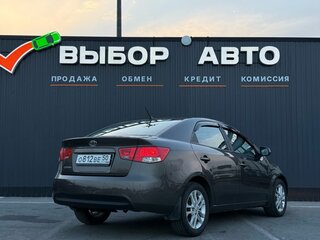2010 Kia Cerato 6-speed II, коричневый, 749000 рублей, вид 2