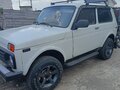 2011 Lada (ВАЗ) 2121 (4x4) I Рестайлинг, белый, 400000 рублей - вид 1