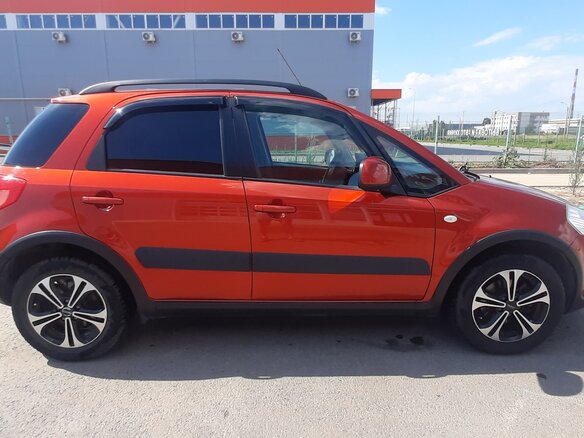 2013 Suzuki SX4 I (Classic) Рестайлинг, оранжевый, 1300000 рублей - вид 3