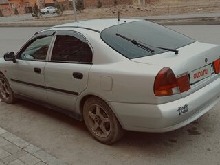 1998 Mitsubishi Carisma I, серебристый, 900000 рублей, вид 2