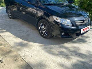 2010 Toyota Corolla X (E140, E150) Рестайлинг, чёрный, 850000 рублей, вид 1