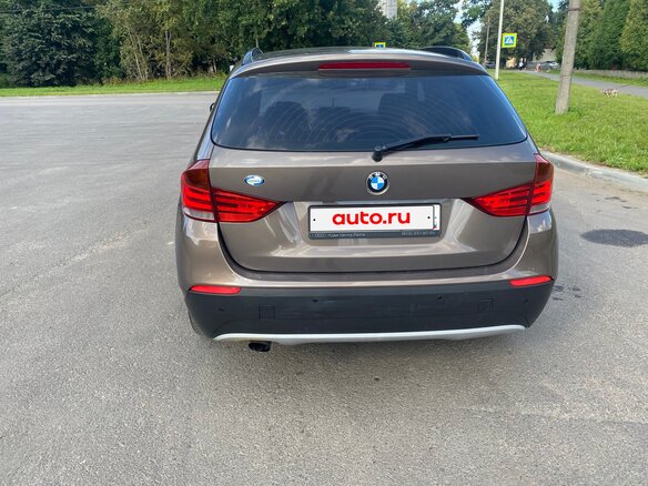 2011 BMW X1 18i I (E84), коричневый - вид 2