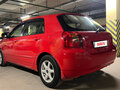 2001 Toyota Corolla Runx IX (E120, E130), красный, 450000 рублей - вид 4