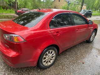 2010 Mitsubishi Lancer X, красный, 715000 рублей, вид 2
