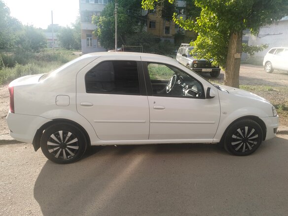2011 Renault Logan I Рестайлинг, белый, 570000 рублей - вид 6