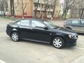 2012 Mitsubishi Lancer X Рестайлинг, чёрный - вид 1