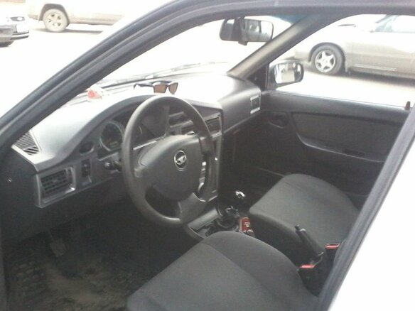 2010 Daewoo Nexia I Рестайлинг, белый - вид 3