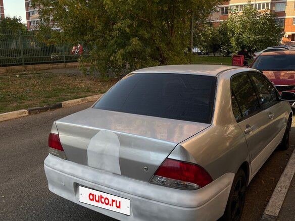 2003 Mitsubishi Lancer Cedia IX, серебристый, 125000 рублей - вид 4