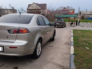 2012 Mitsubishi Lancer X Рестайлинг, серебристый, 780000 рублей, вид 5