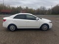 2010 Kia Cerato 5-speed II, белый, 620000 рублей - вид 1