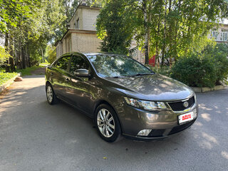 2010 Kia Cerato 4-speed II, золотистый, 555000 рублей, вид 1