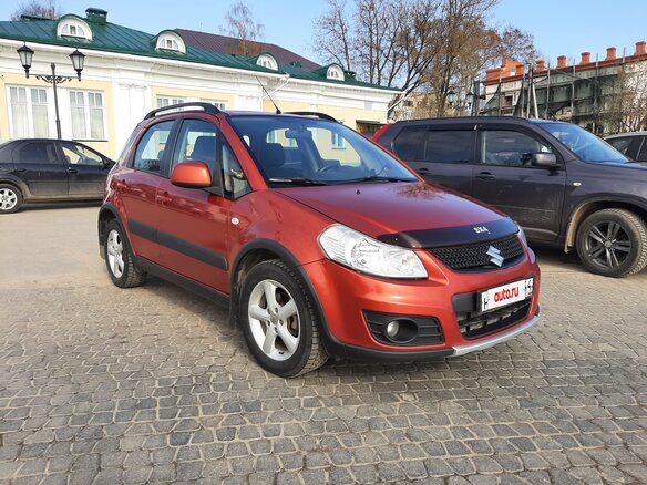 2011 Suzuki SX4 I (Classic) Рестайлинг, оранжевый - вид 2