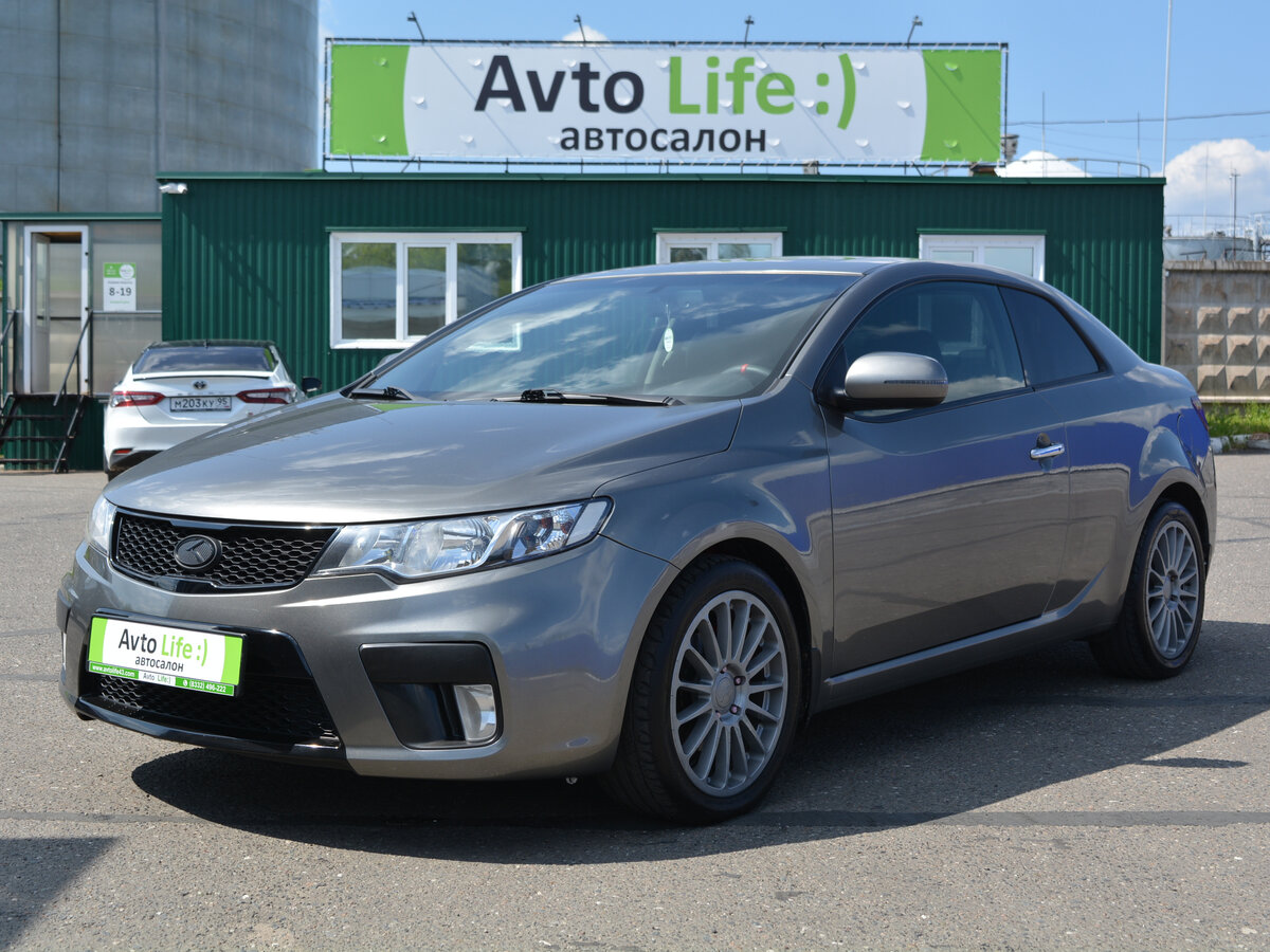 Открыть фотографии: Kia Cerato II