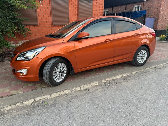 2015 Hyundai Solaris I Рестайлинг, оранжевый, 1079000 рублей - вид 3