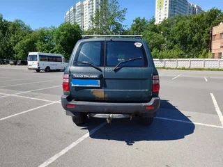2004 Toyota Land Cruiser 100 Series Рестайлинг 1, зелёный, 1300000 рублей, вид 4