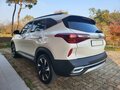2023 Kia Seltos I, белый, 1853000 рублей - вид 4