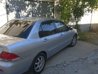 2007 Mitsubishi Lancer IX Рестайлинг, серебристый, 400000 рублей, вид 3
